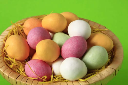 Fondant Easter eggs in a basket