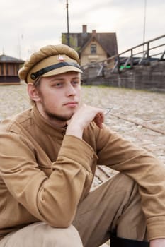 Retro style picture with resting soldier
