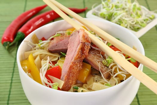 Duck breast with fried noodles