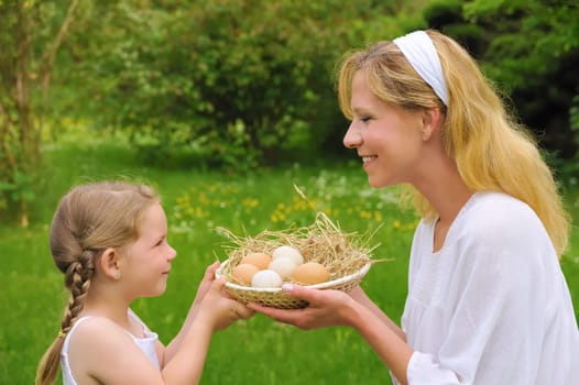 Mother and daughter having Easter time