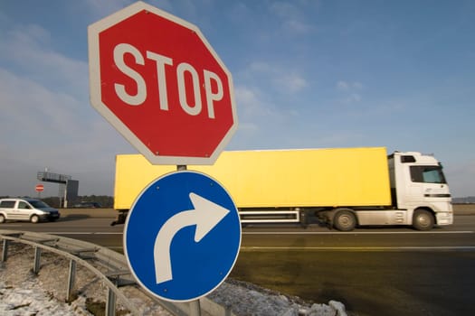 Traffic signs at a motorway slip road