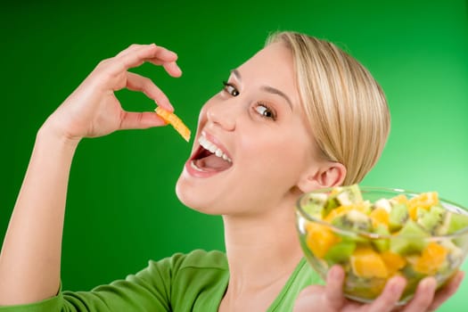 Healthy lifestyle - woman with fruit
