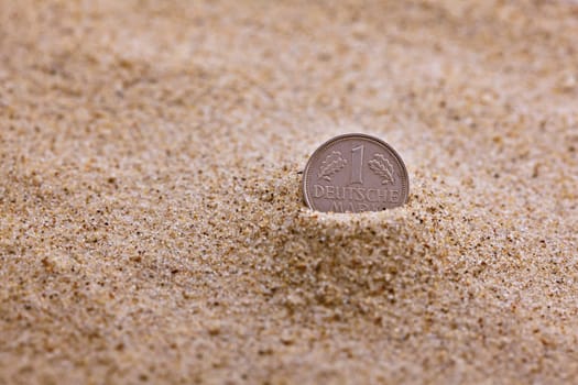 D-Mark put in the sand .....