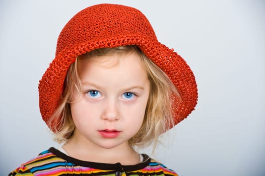 little girl with red hat