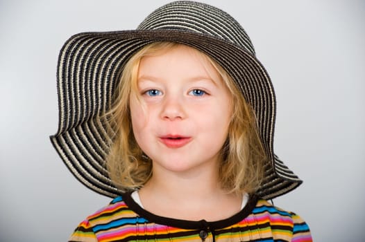 little girl with red hat
