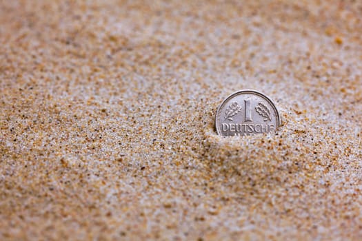 D-Mark put in the sand .....