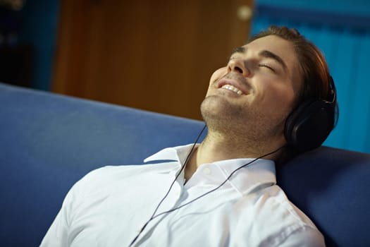 man with headphones listening to music