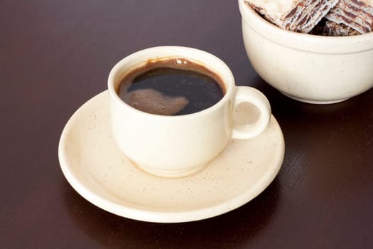 Black coffee with waffles
