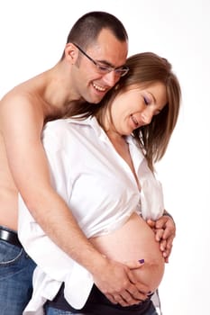 Happy young man and his pregnant wife