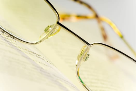 Glasses on book