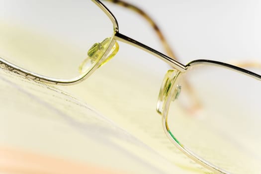 Glasses on book