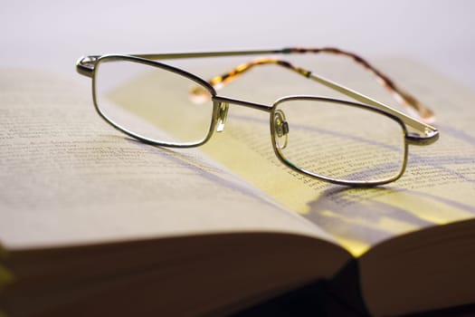 Glasses on book