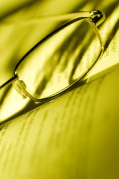 Glasses on book
