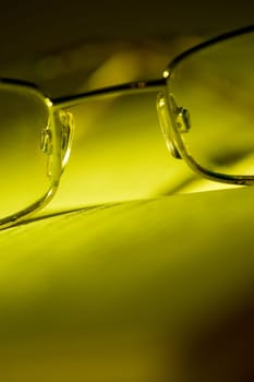 Glasses on book