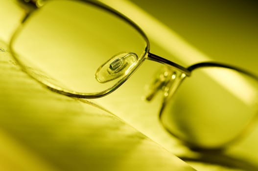 Glasses on book