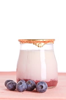 Yogurt and fresh blueberries