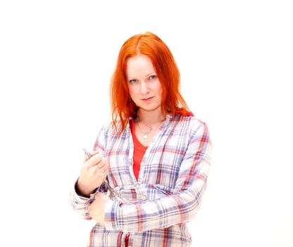 redhead young woman cooks dinner