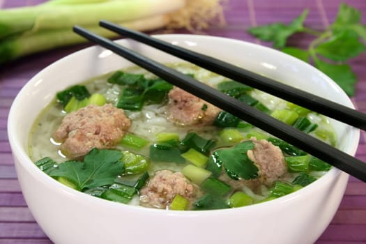 Rice soup with meatballs