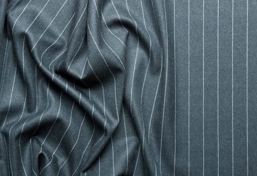Pin striped suit with creases