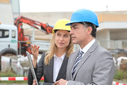 Business people on construction site