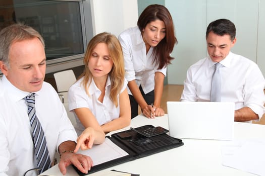 Business people meeting around table