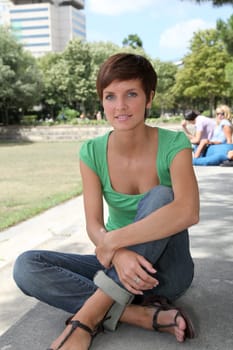 Student siiting in college park