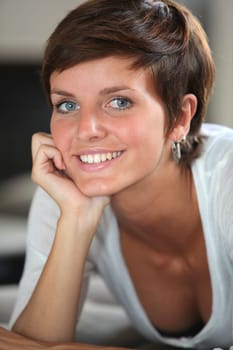 Closeup of beautiful young woman with blue eyes