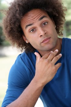 Closeup of young man with suprised look