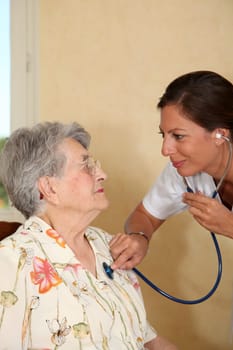 Elderly person with nurse