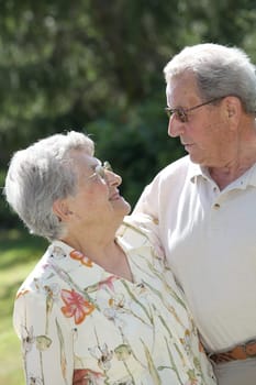 Closeup of senior couple in garden