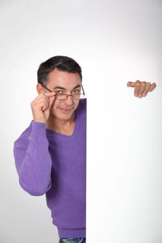 man showing message board