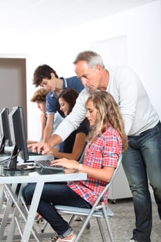 Teenagers in computing class