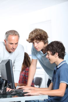Teenagers in computing class