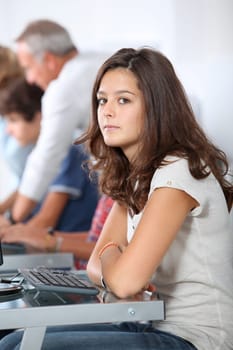 Closeup of young student sitting in class