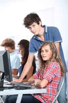 Teenagers in computing class