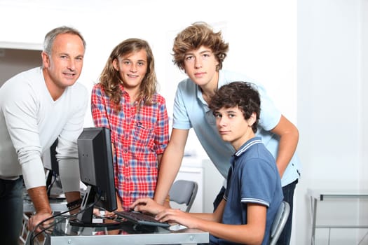 Teenagers in computing class