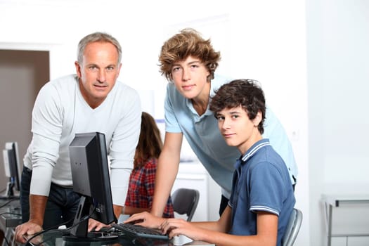 Teenagers in computing class