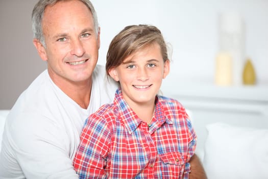 Closeup of father and daughter at home