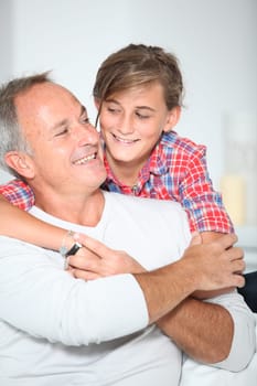 Closeup of father and daughter at home