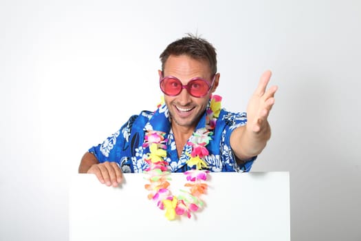Man with hawaan shirt on white background