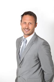 Businessman standing in white background