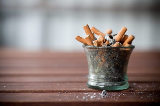 ashtray full with butts