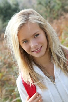 Closeup of beautiful young girl on hiking day
