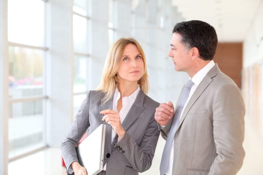 Business partners meeting in modern building