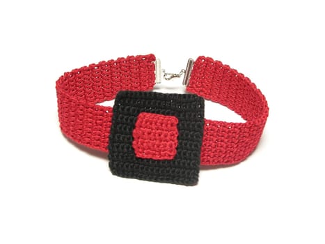 Homemade crochet choker with red and black square