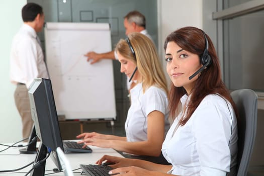 Group of people attending business presentation