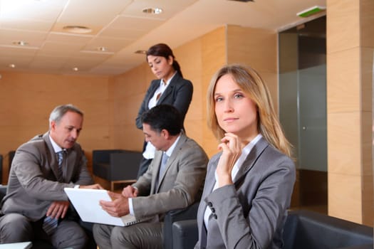Group of associates meeting in lounge