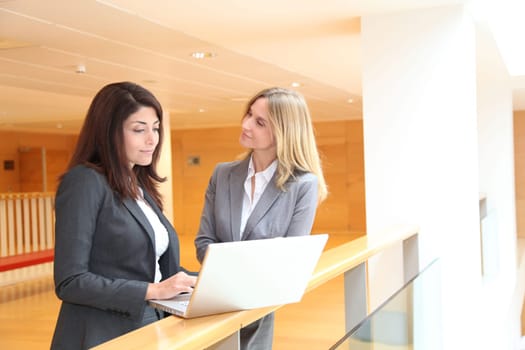 Businesswomen meeting in hall