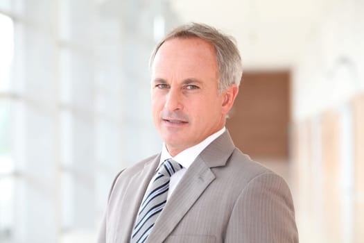 Closeup of businessman in grey suit