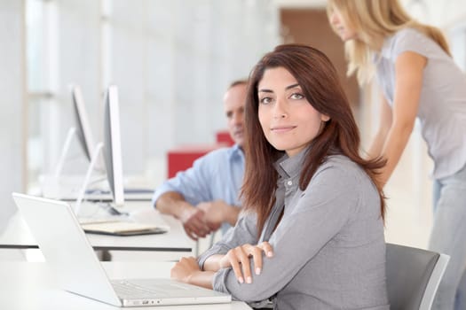 Businesswoman working on laptop computer